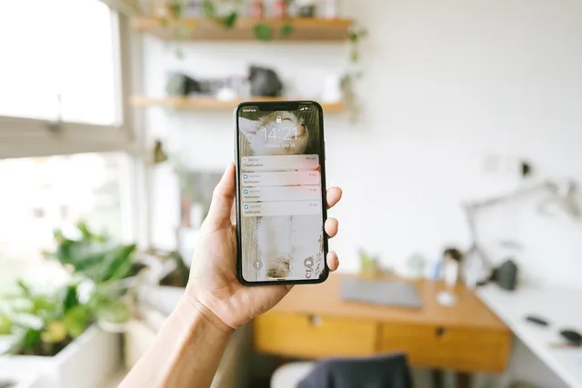 iphone, hand, phone, mobile phone, smart phone, technology, hand holding a phone, notify, notifications, updates, messages, iphone, iphone, phone, phone, phone, phone, phone, mobile phone, smart phone, smart phone, notifications. Does the DMCC Act change UK SaaS renewal emails?