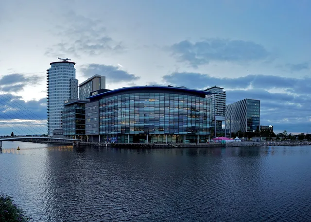 manchester, eve, modern, building, architecture, facade, city, big city, evening atmosphere, urban, skyscraper, manchester, manchester, manchester, manchester, manchester. Manchester and Leeds compared for SaaS marketing operations
